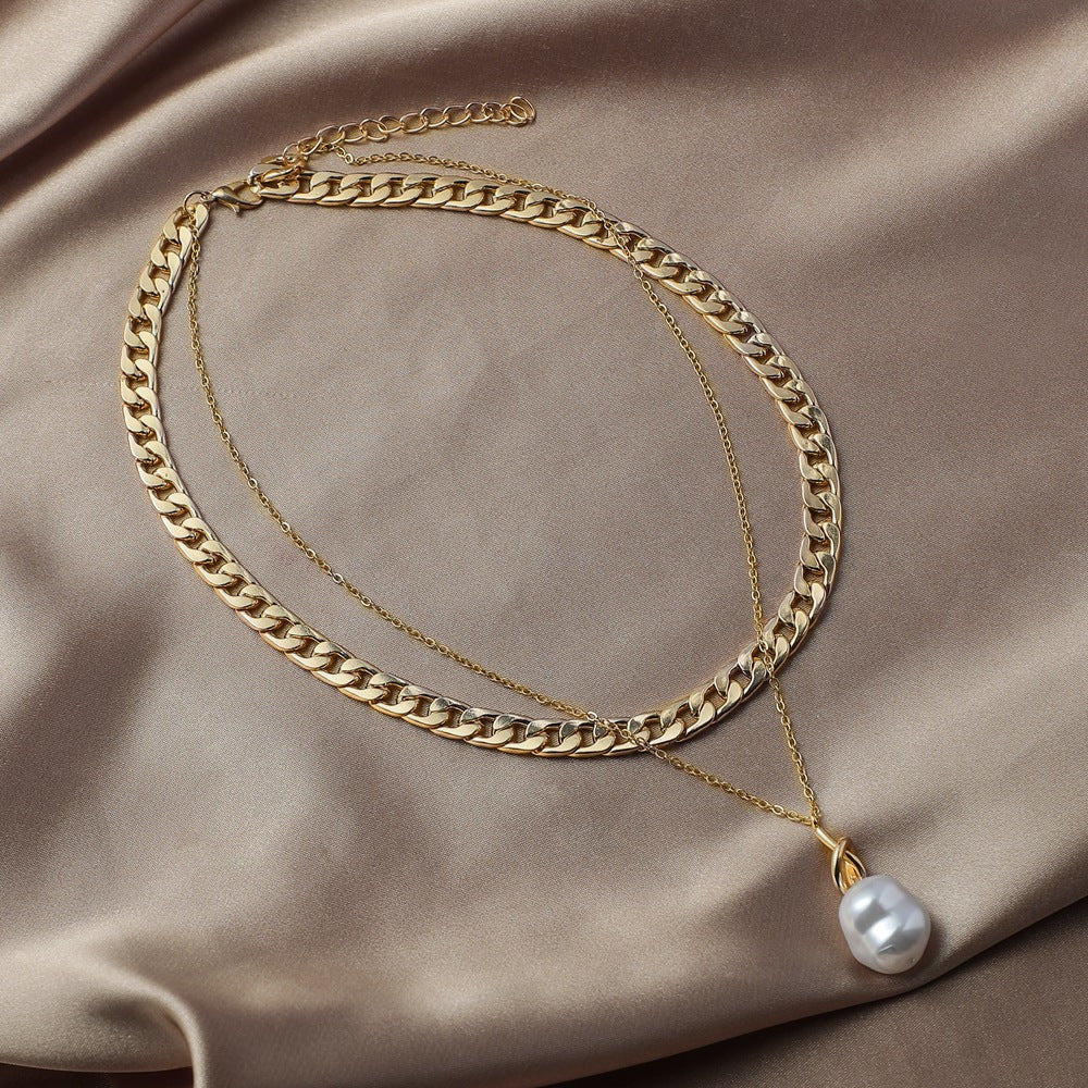Baroque pearl pendant necklace on gold-tone chain