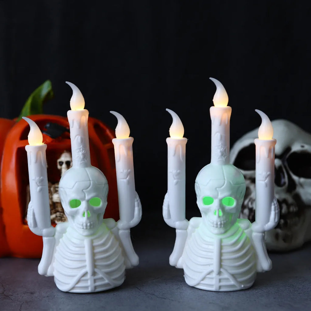 Halloween skull candlestick with glowing LED electronic candle