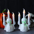 Halloween skull candlestick with glowing LED electronic candle