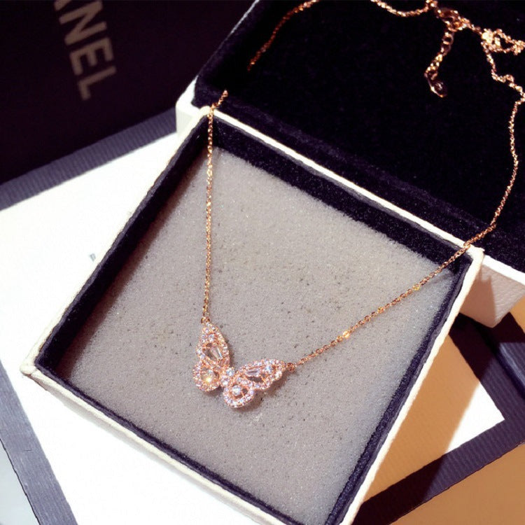 Gold-tone chain with butterfly charm