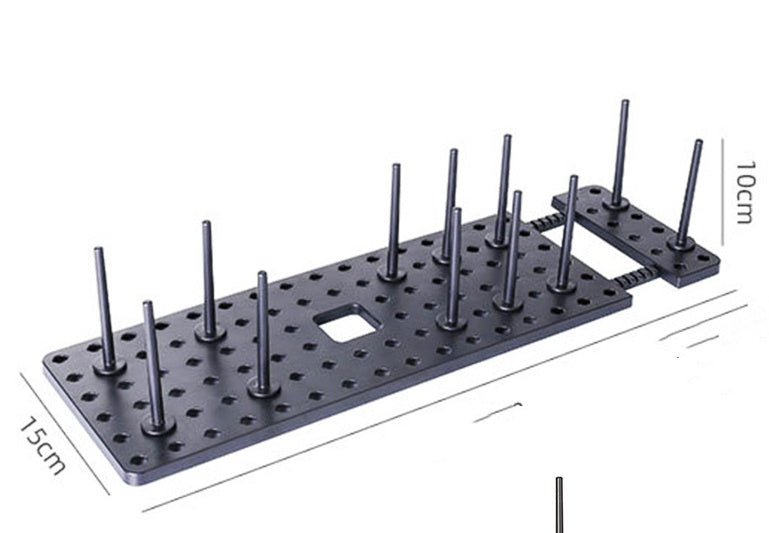 Expandable black dish drying rack with moveable pegs