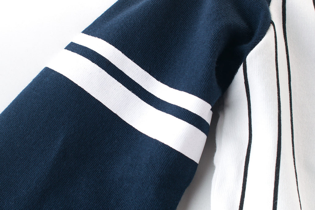 Navy sleeve cuff with white stripe detail