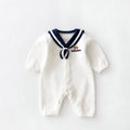 White baby romper with navy sailor collar, thick air cotton style