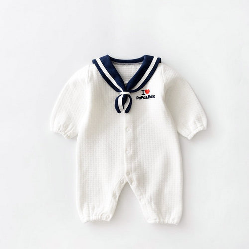 White baby romper with navy sailor collar, thick air cotton style