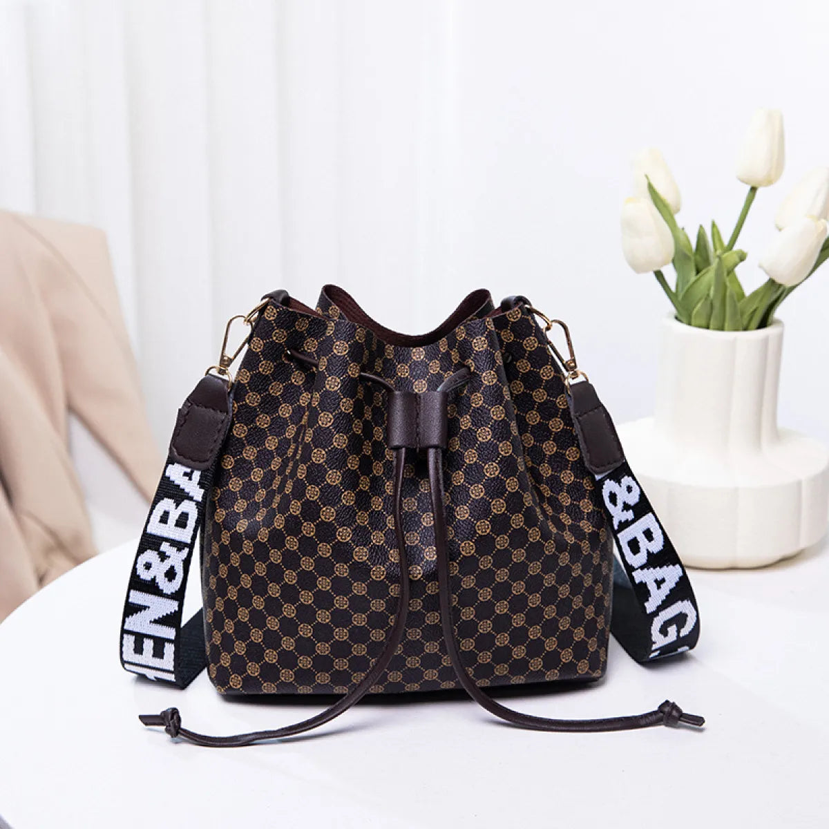 Women's beige PU bucket crossbody bag with adjustable strap