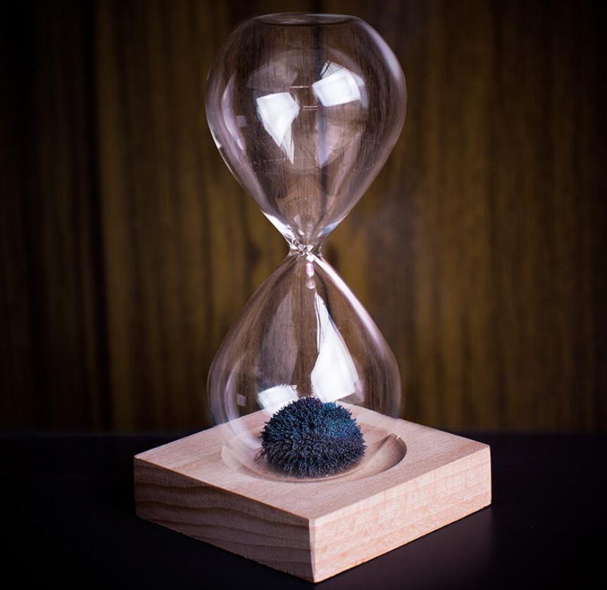 Magnetic hourglass sand timer on wooden base – view 1