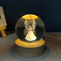 Laser-engraved deer crystal ball night light on wooden base – view 1