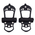 Pair of black 10-stud ice cleats, top view