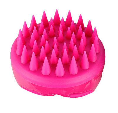 Silicone scalp brush used in the shower