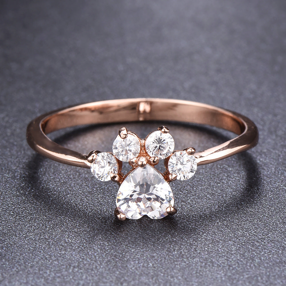 Cat paw ring worn on a finger