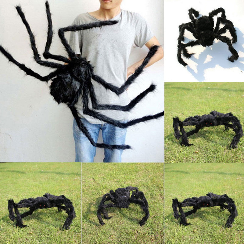 Giant black plush spider held up to show its large size