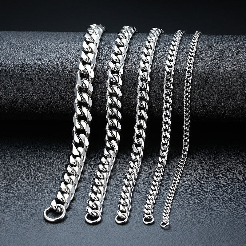 Gold Cuban link bracelet coiled flat
