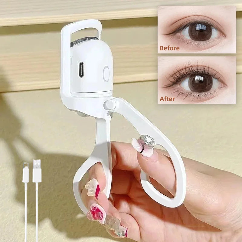 White USB heated eyelash curler held for lash curling
