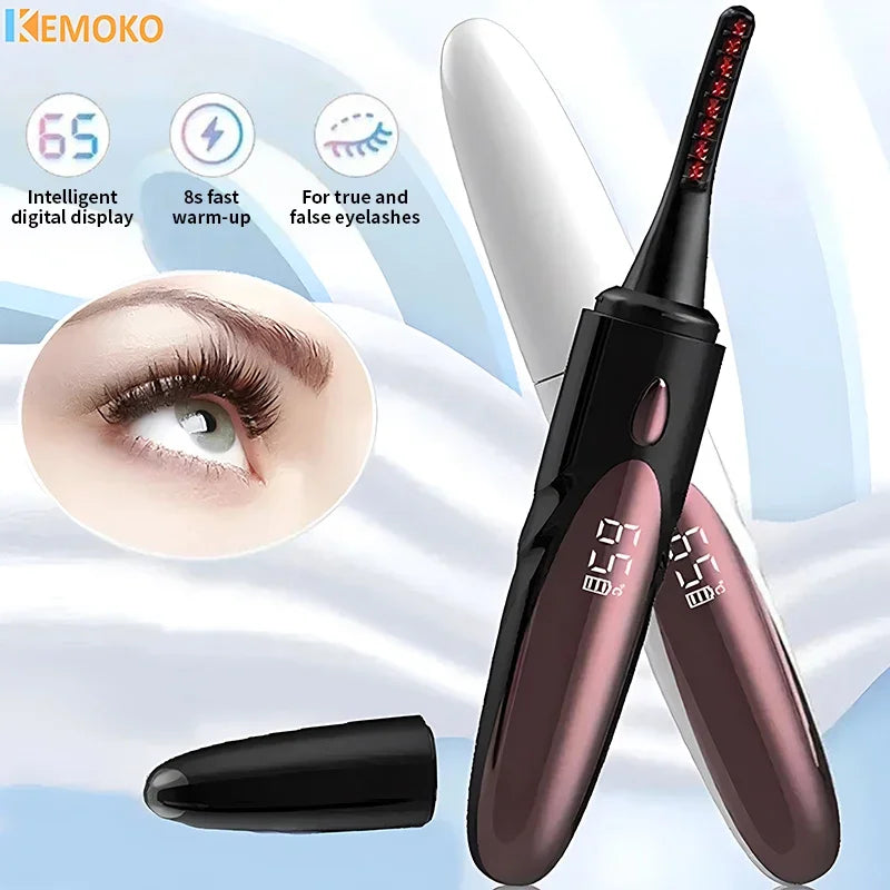 White USB heated eyelash curler held for lash curling