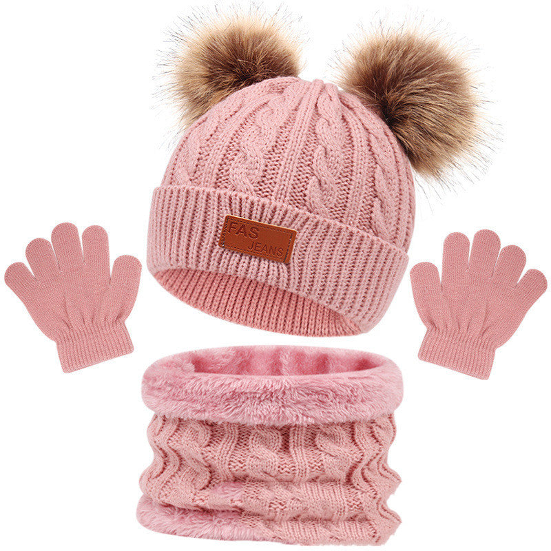 Pink cable-knit hat with scarf and gloves