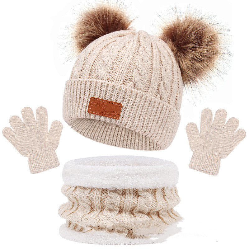 Beige kids' pom-pom hat with matching scarf and gloves