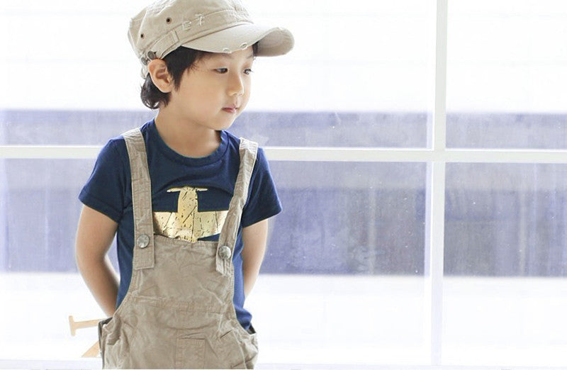 Child wearing the navy airplane T-shirt