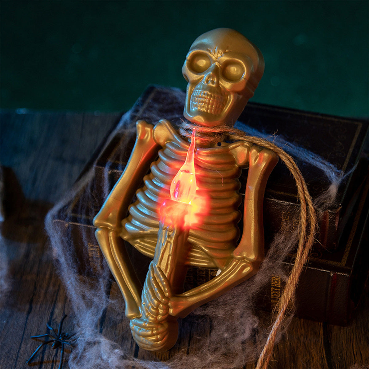 Gold skeleton LED candle light – view 1