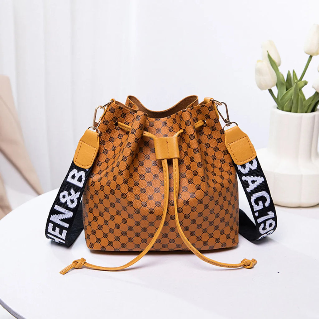 Women's beige PU bucket crossbody bag with adjustable strap
