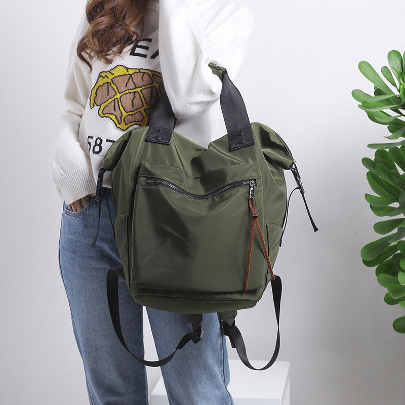 Green teen laptop backpack with bottle pockets