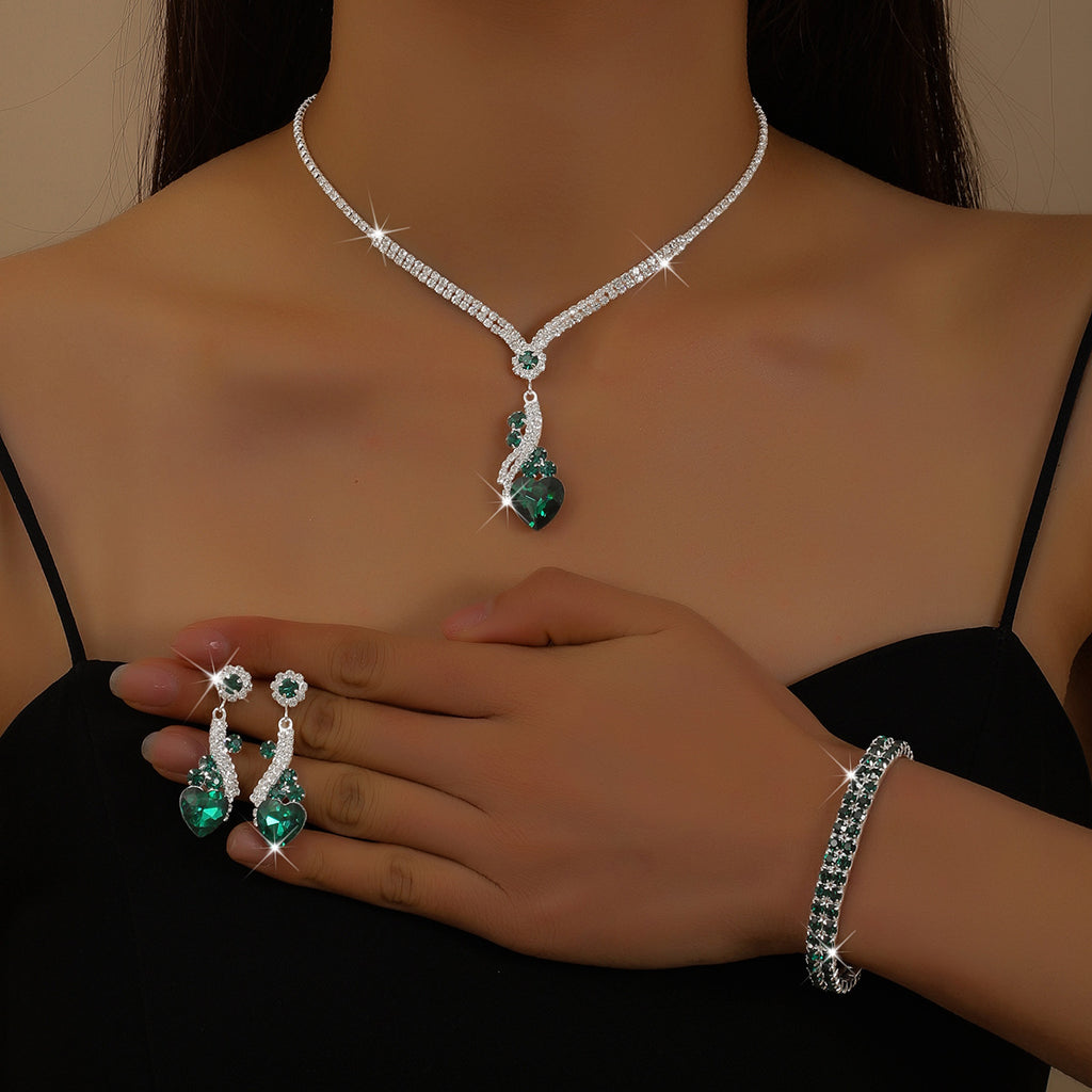 Emerald CZ four-piece jewelry set
