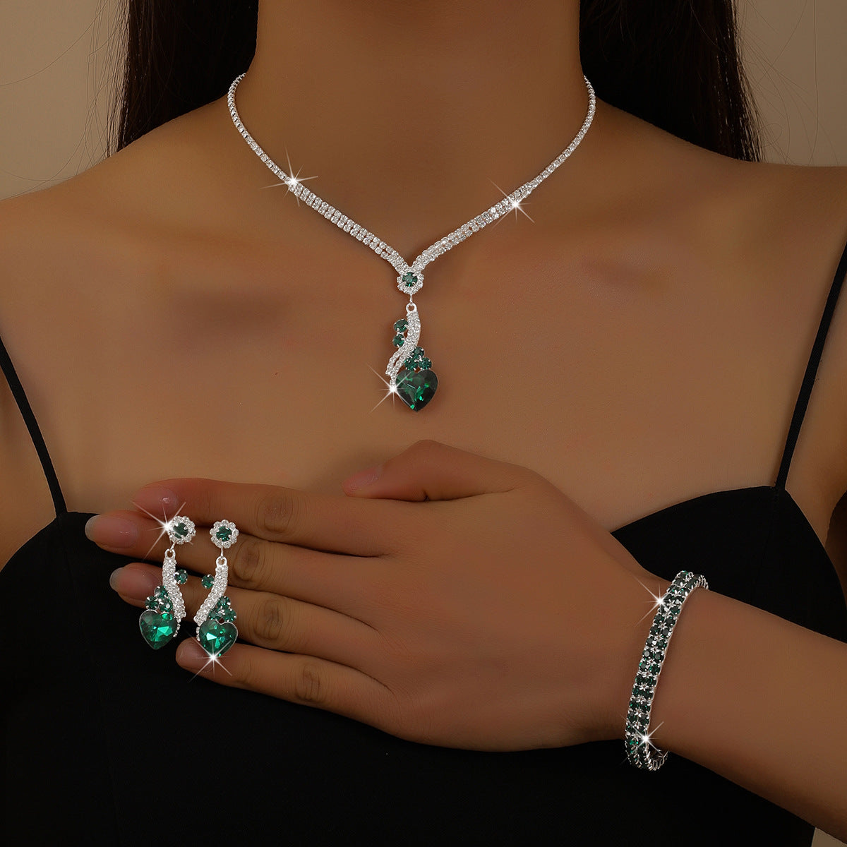 Emerald CZ four-piece jewelry set