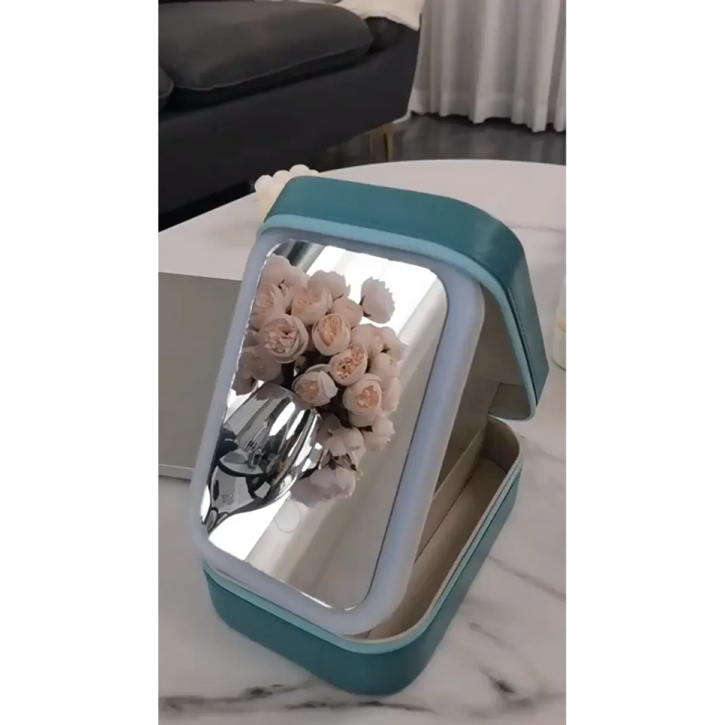 LED makeup mirror box open showing compartments