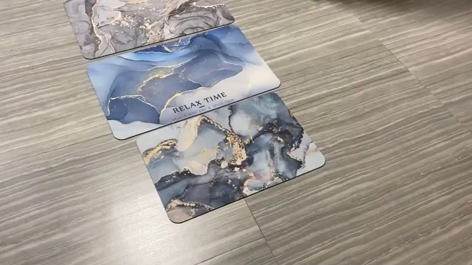 Quick-dry diatomite bath mat on a bathroom floor