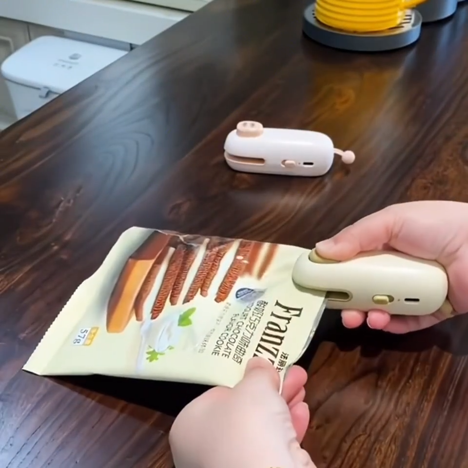 USB mini bag sealer sealing a snack bag