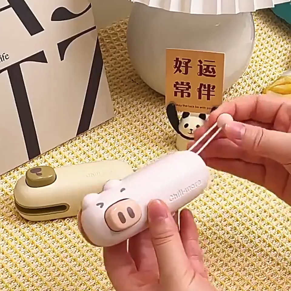 USB mini bag sealer sealing a snack bag