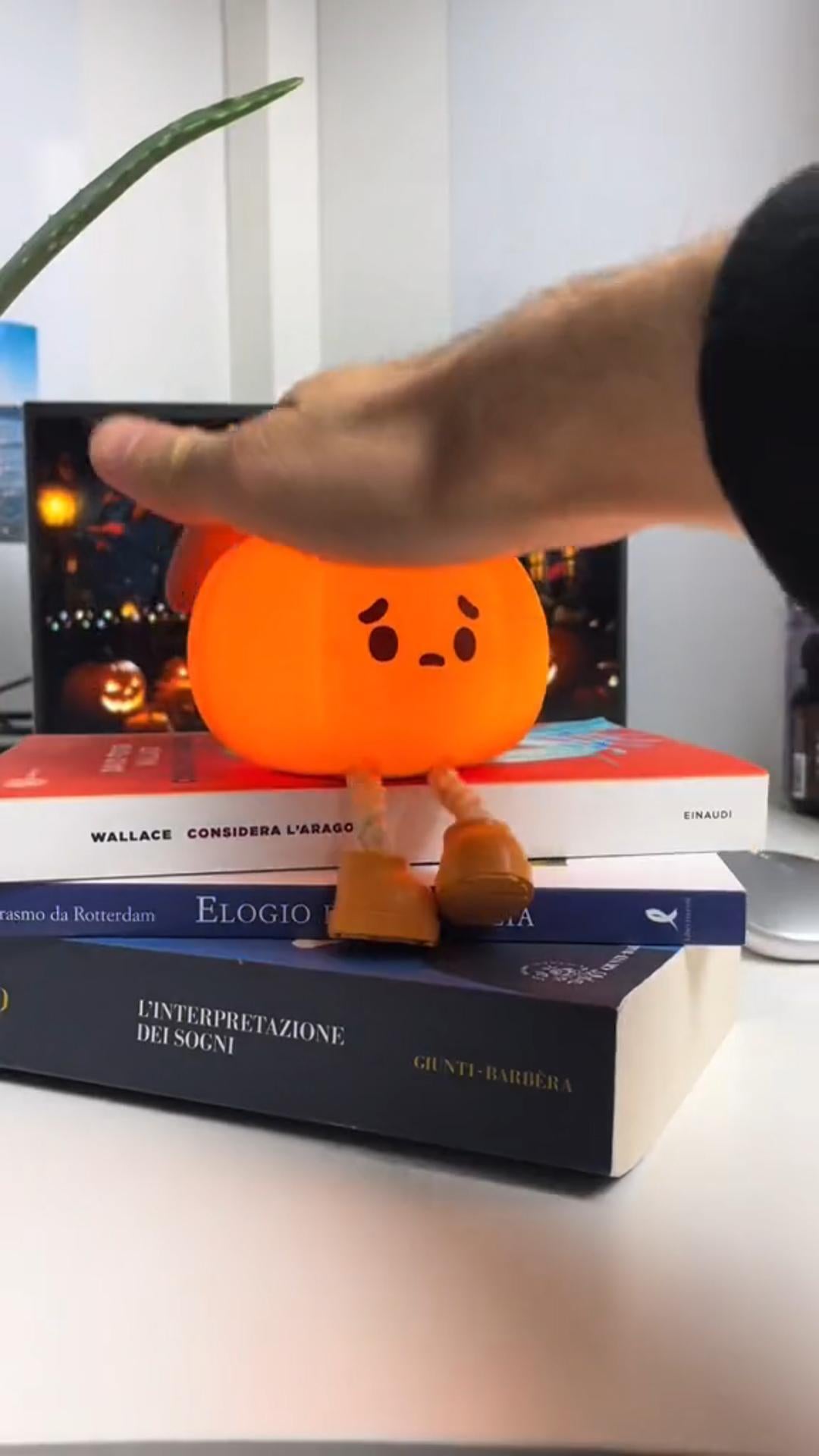 Soft silicone Halloween pumpkin night light glowing warm orange